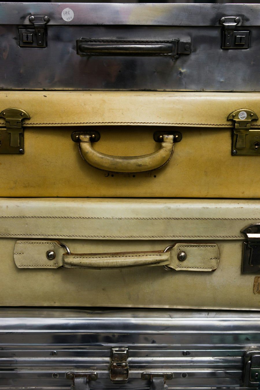 Stacked travel suitcases representing useful travel gadgets