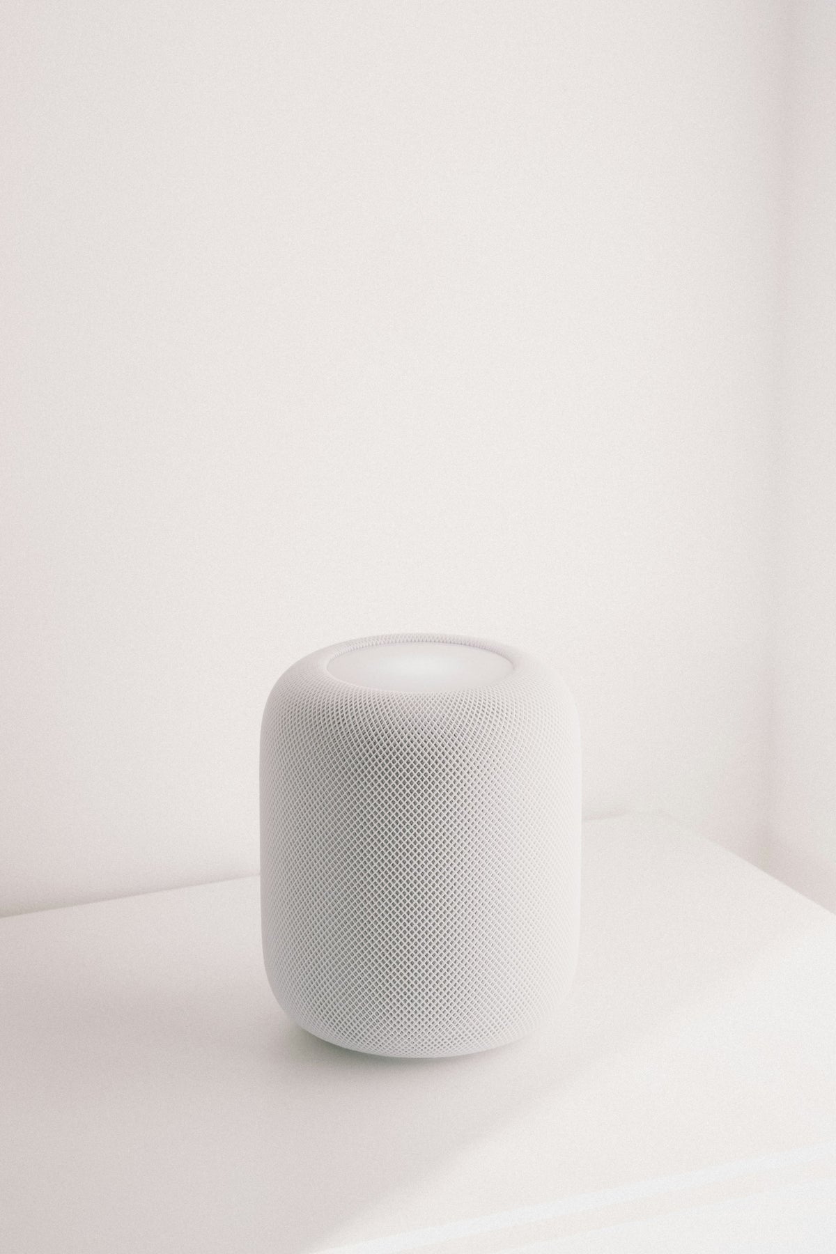 Minimal white smart speaker for a connected home